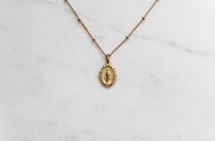 Intricate Miraculous medal necklace