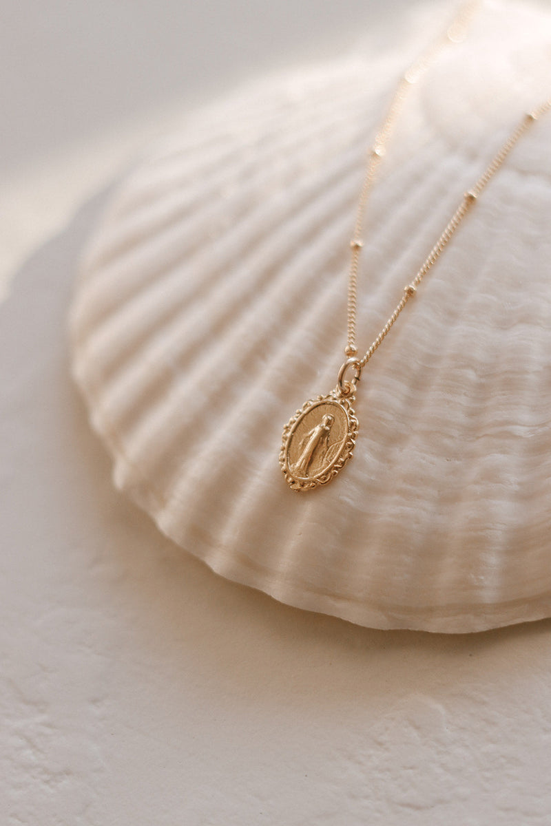 Intricate Miraculous medal necklace